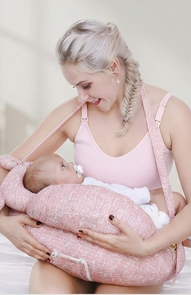 Mom feeding her baby with the EaseMama Nursing Support